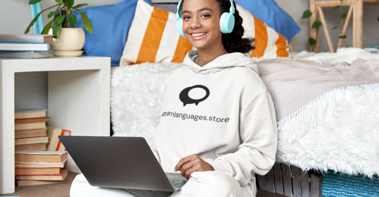 hoodie-mockup-featuring-a-happy-young-woman-listening-to-music-while-studying-m9736-r-el2