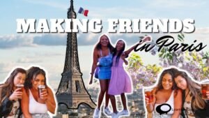 A group of diverse friends enjoying a conversation, reflecting on the question: 'Is it harder to make friends in France?'"