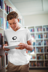 mockup-of-a-teenager-with-a-heathered-v-neck-t-shirt-using-a-device-at-the-library-41578-r-el2