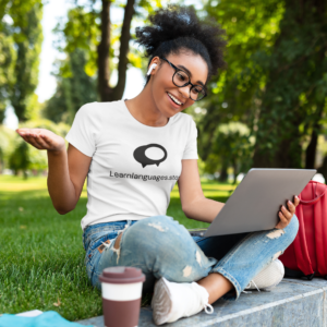 tee-mockup-of-a-woman-with-glasses-having-a-video-conference-on-her-laptop-m16322-r-el2